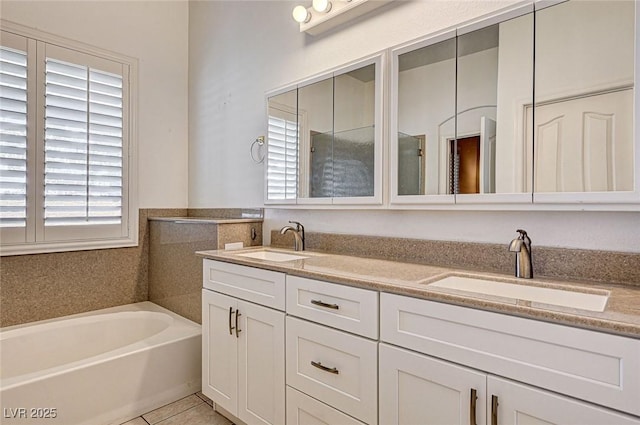 1574 Livingston Dr, Henderson, NV 89012 - full bathroom featuring double vanity, a bath, and tile patterned floors