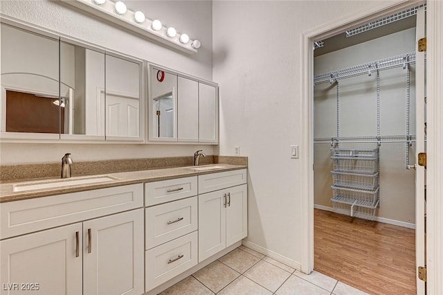 1574 Livingston Dr, Henderson, NV 89012 - bathroom featuring double vanity and tile patterned flooring