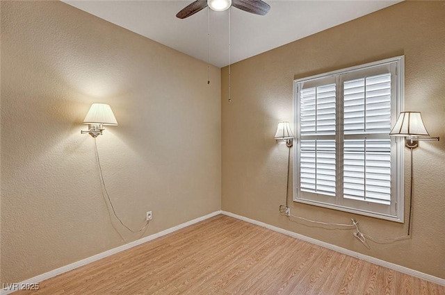 1574 Livingston Dr, Henderson, NV 89012 - unfurnished room with wood finished floors and a ceiling fan