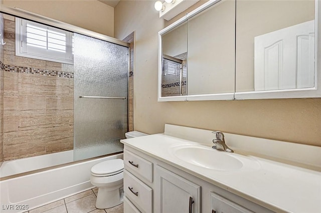 1574 Livingston Dr, Henderson, NV 89012 - bathroom with vanity, tile patterned flooring, and combined bath / shower with glass door