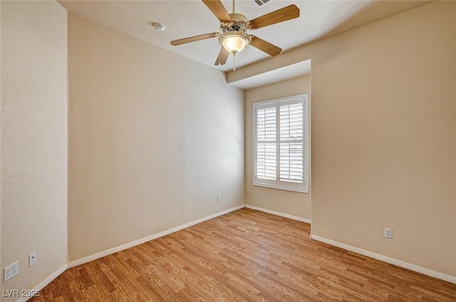 1574 Livingston Dr, Henderson, NV 89012 - spare room with light wood-style flooring, a smoke detector, and ceiling fan