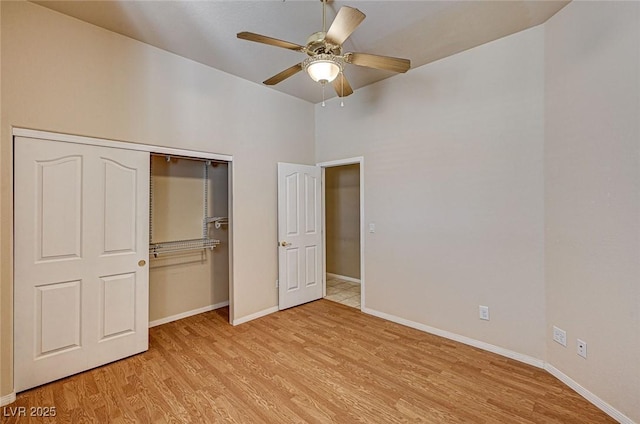 1574 Livingston Dr, Henderson, NV 89012 - unfurnished bedroom with light wood-style flooring, a closet, and ceiling fan