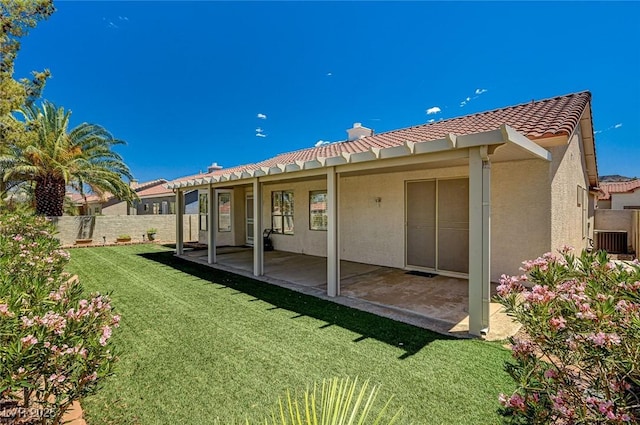 1574 Livingston Dr, Henderson, NV 89012 - back of property with stucco siding, a tile roof, a patio area, and a chimney
