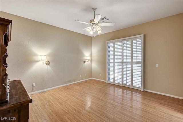 1574 Livingston Dr, Henderson, NV 89012 - empty room featuring wood finished floors and ceiling fan
