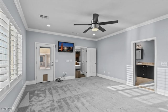 unfurnished bedroom with baseboards, ornamental molding, and visible vents