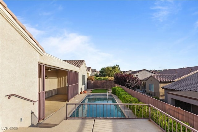 view of pool featuring a fenced in pool, a fenced backyard, and a patio area