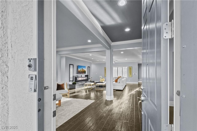 foyer featuring crown molding, recessed lighting, baseboards, and hardwood / wood-style floors