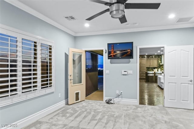 unfurnished bedroom with crown molding, recessed lighting, and visible vents