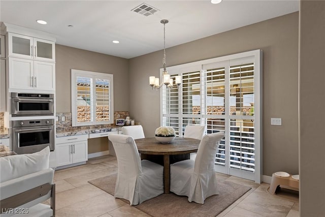 2 Olympia Outlook Dr, Las Vegas, NV 89141 - dining room featuring a chandelier, recessed lighting, and light tile patterned floors