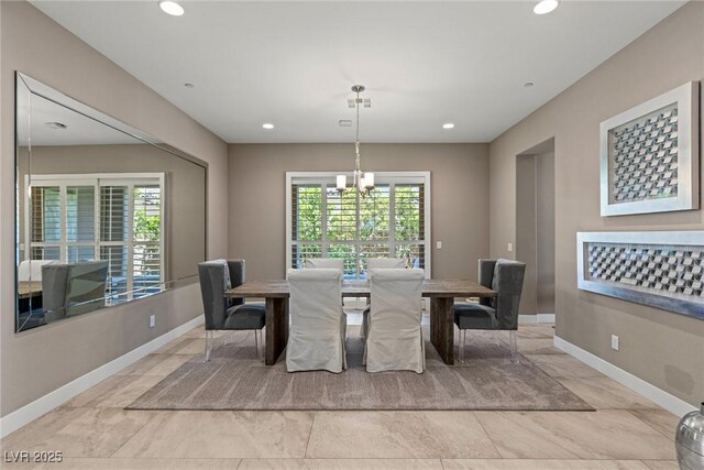 dining room featuring an inviting chandelier, baseboards, and recessed lighting