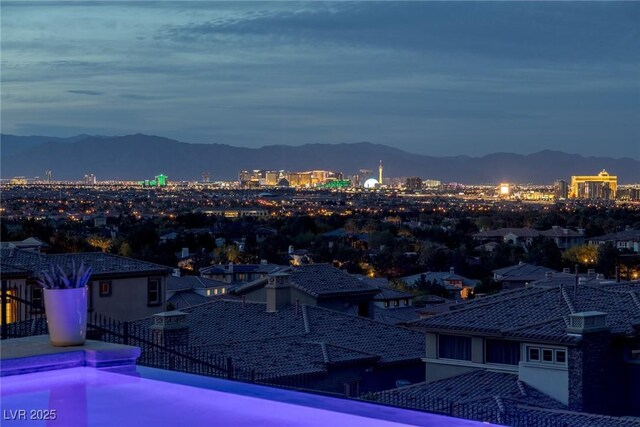 view of mountain feature with a view of city