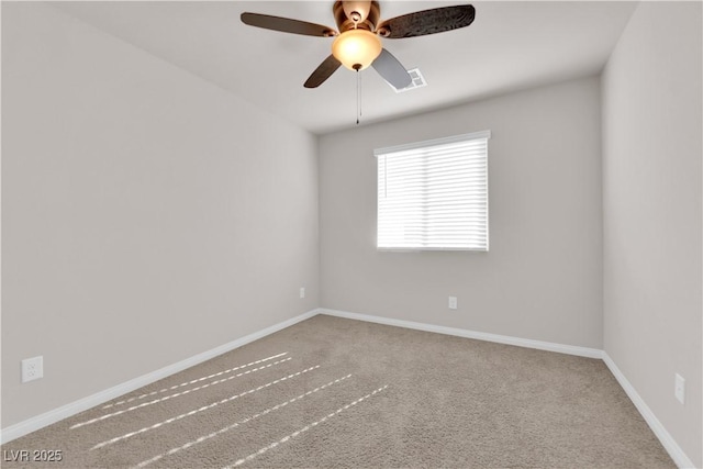 5252 Sunstone Mesa Dr, Las Vegas, NV 89166 - spare room featuring baseboards, a ceiling fan, and carpet