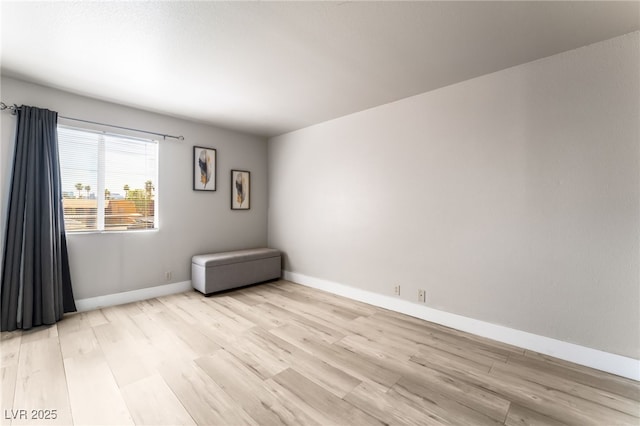 5020 Indian River Dr Unit 424, Las Vegas, NV 89103 - unfurnished room featuring light wood-style floors and baseboards