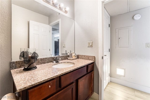 5020 Indian River Dr Unit 424, Las Vegas, NV 89103 - bathroom featuring a textured wall and vanity