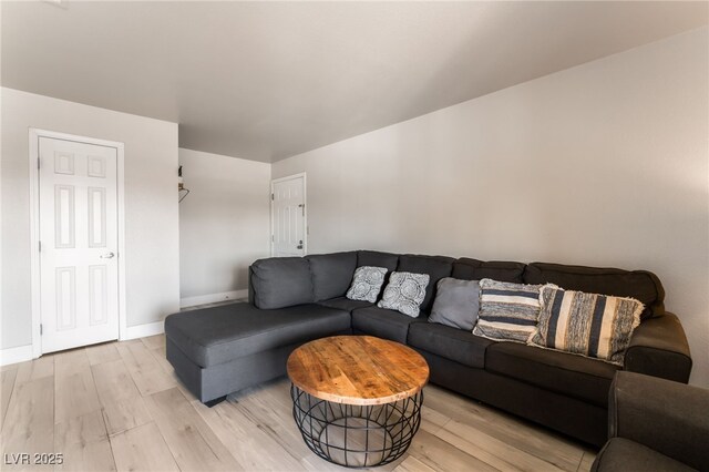 5020 Indian River Dr Unit 424, Las Vegas, NV 89103 - living area with light wood-style floors and baseboards