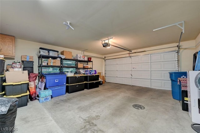 garage featuring a garage door opener