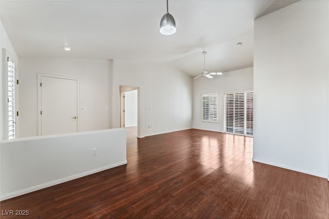 10029 Netherton Dr, Las Vegas, NV 89134 - interior space with baseboards, ceiling fan, vaulted ceiling, and wood finished floors