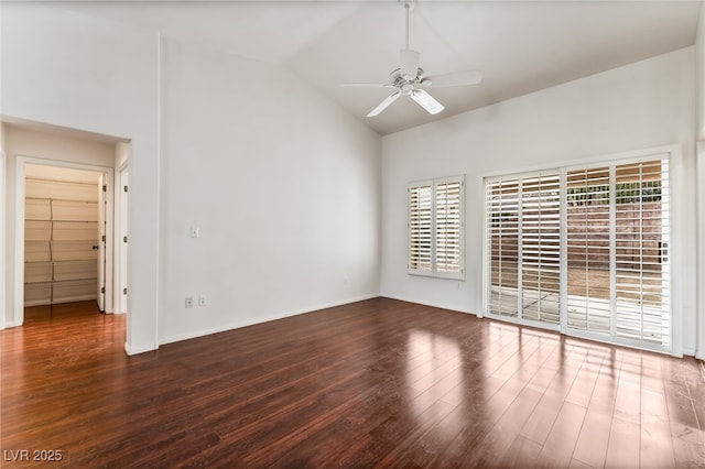 10029 Netherton Dr, Las Vegas, NV 89134 - spare room with vaulted ceiling, baseboards, a ceiling fan, and wood finished floors