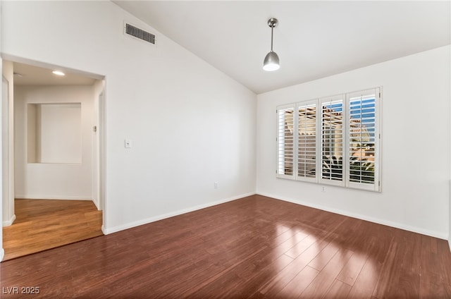 10029 Netherton Dr, Las Vegas, NV 89134 - empty room with baseboards, visible vents, wood finished floors, and high vaulted ceiling