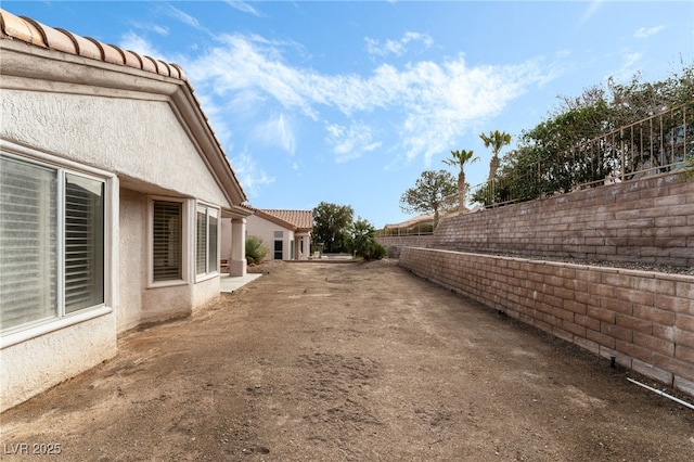 10029 Netherton Dr, Las Vegas, NV 89134 - view of yard featuring fence