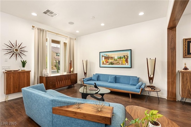 living room featuring recessed lighting and wood finished floors