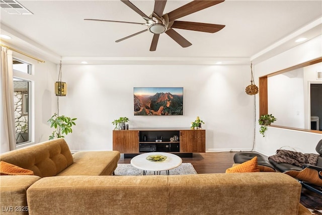 living room featuring ceiling fan, recessed lighting, wood finished floors, and visible vents