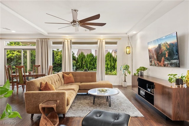 living room with recessed lighting, ceiling fan, visible vents, and dark wood-type flooring