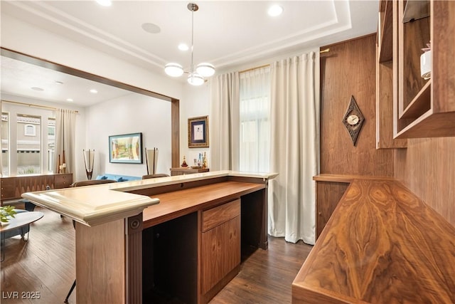 bar featuring recessed lighting, pendant lighting, dark wood-style floors, and a wealth of natural light