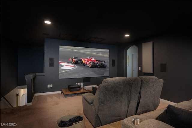 cinema with carpet floors, arched walkways, baseboards, and recessed lighting