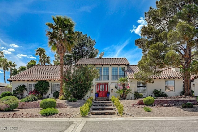 3151 Coachlight Cir, Las Vegas, NV 89117 - view of front facade featuring stucco siding and a tile roof