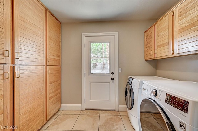 3151 Coachlight Cir, Las Vegas, NV 89117 - laundry area with cabinet space, light tile patterned flooring, baseboards, and washer and clothes dryer