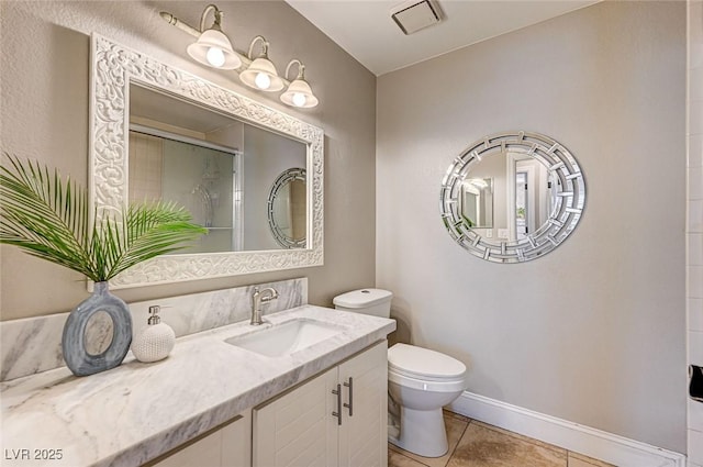 3151 Coachlight Cir, Las Vegas, NV 89117 - full bathroom with tile patterned flooring, vanity, toilet, baseboards, and visible vents