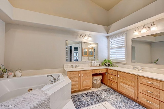3151 Coachlight Cir, Las Vegas, NV 89117 - full bathroom featuring double vanity, a sink, a whirlpool tub, and tile patterned floors
