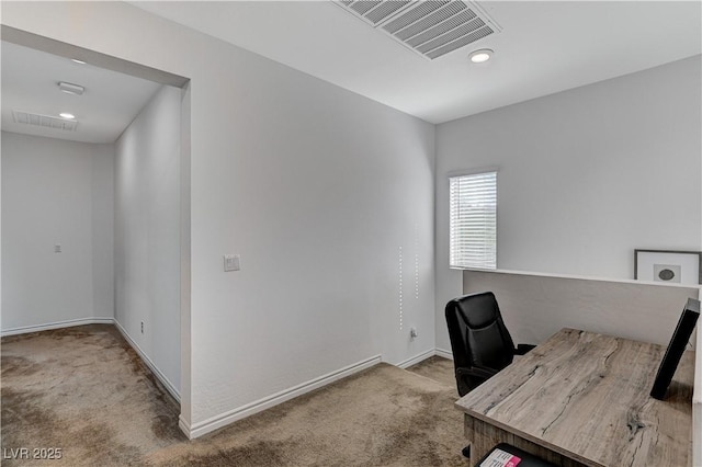 unfurnished office with visible vents, recessed lighting, carpet, and baseboards