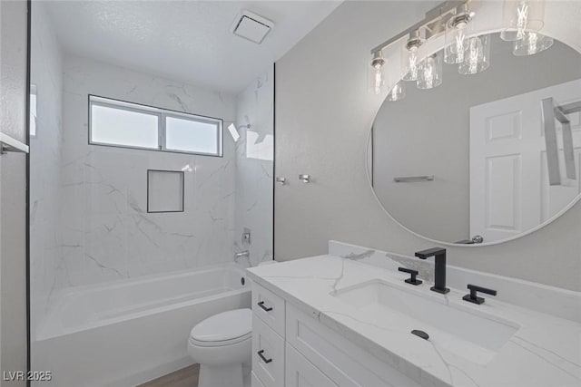 bathroom featuring tub / shower combination, vanity, toilet, and visible vents
