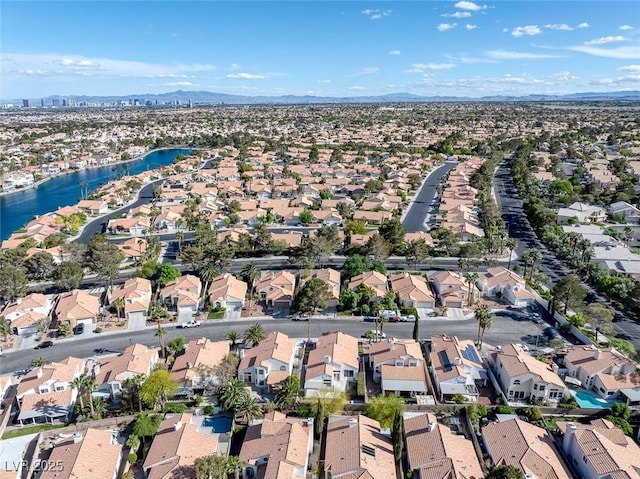 aerial view with a residential view and a water and mountain view