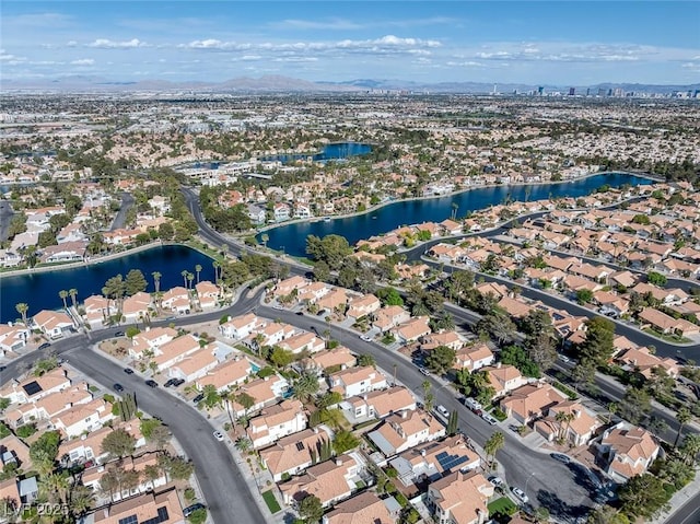 aerial view with a water view and a residential view