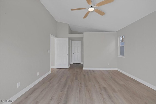 unfurnished room featuring baseboards, a ceiling fan, high vaulted ceiling, and light wood-style flooring