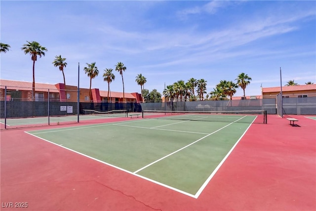 view of sport court featuring community basketball court and fence