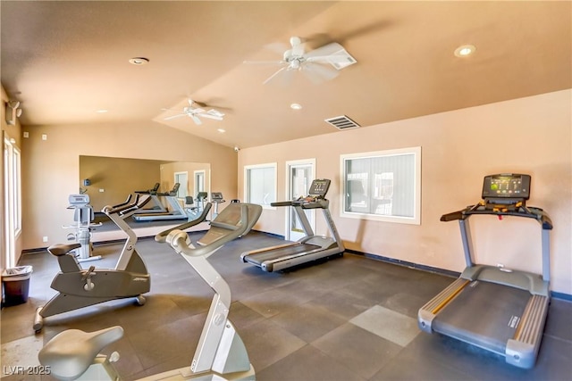 exercise room with visible vents, baseboards, ceiling fan, and lofted ceiling