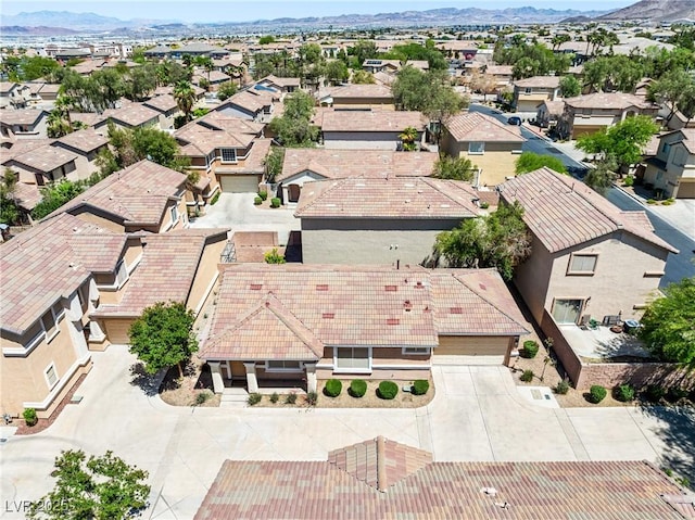 bird's eye view featuring a mountain view and a residential view
