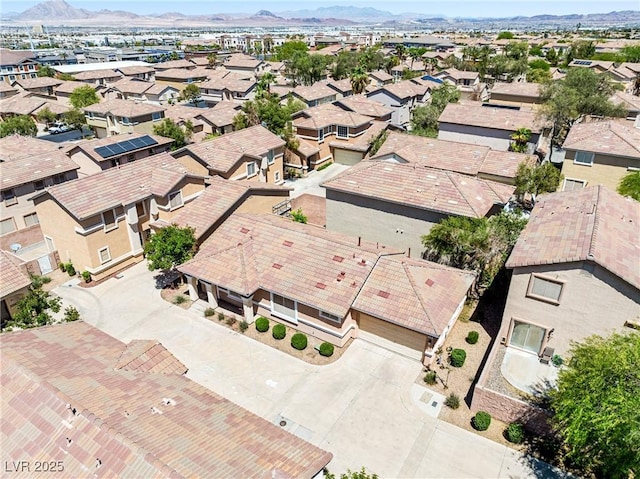 aerial view with a residential view and a mountain view