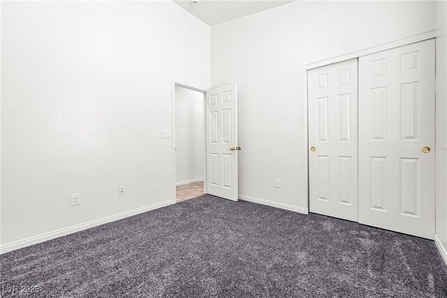 1440 Summer Glow Ave, Henderson, NV 89012 - unfurnished bedroom featuring carpet floors, baseboards, and a closet