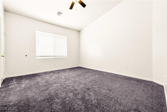 unfurnished room featuring a ceiling fan, baseboards, visible vents, and dark colored carpet