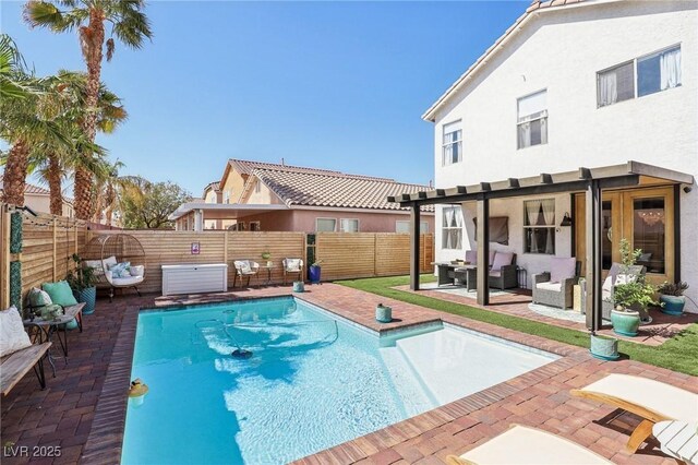 7566 Hope Valley St, Las Vegas, NV 89139 - view of pool featuring a fenced backyard, a fenced in pool, a patio, and outdoor lounge area