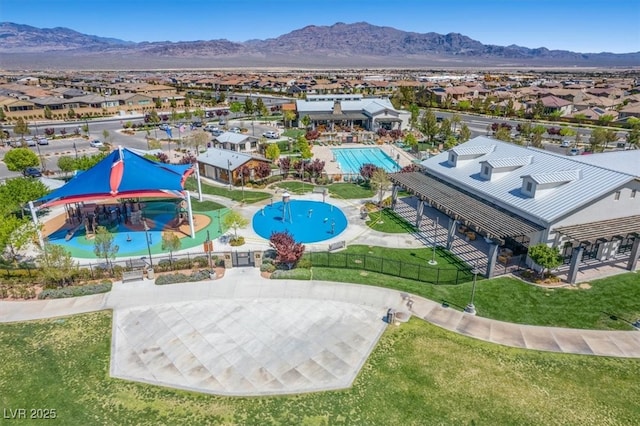 bird's eye view with a residential view and a mountain view