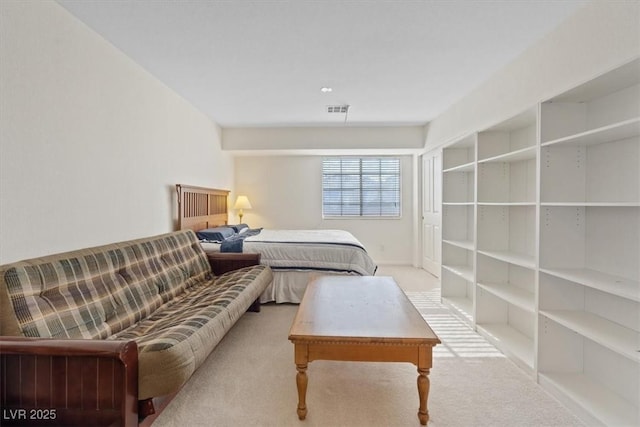 carpeted bedroom with visible vents