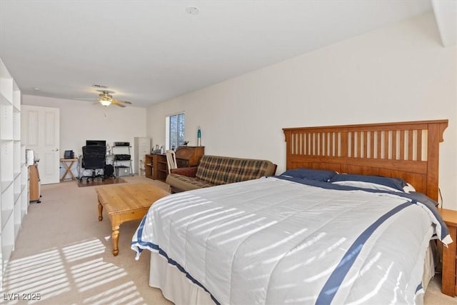 bedroom featuring ceiling fan and light colored carpet