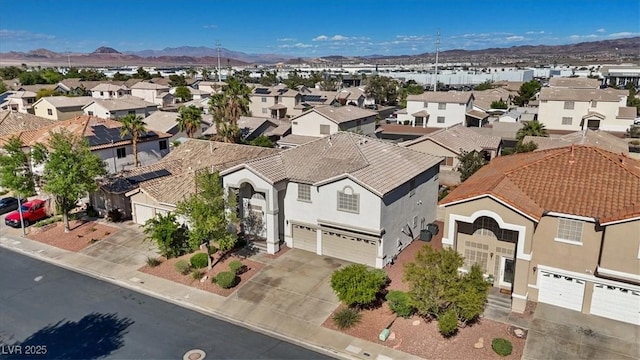 aerial view featuring a residential view and a mountain view