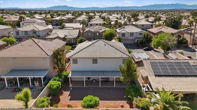 aerial view with a residential view and a mountain view